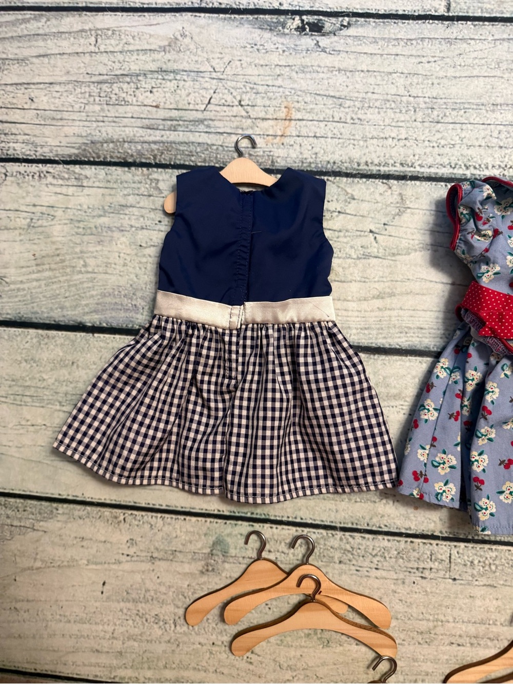 2 American girl doll dresses and 10 wood doll hangers. - Picture 6 of 10